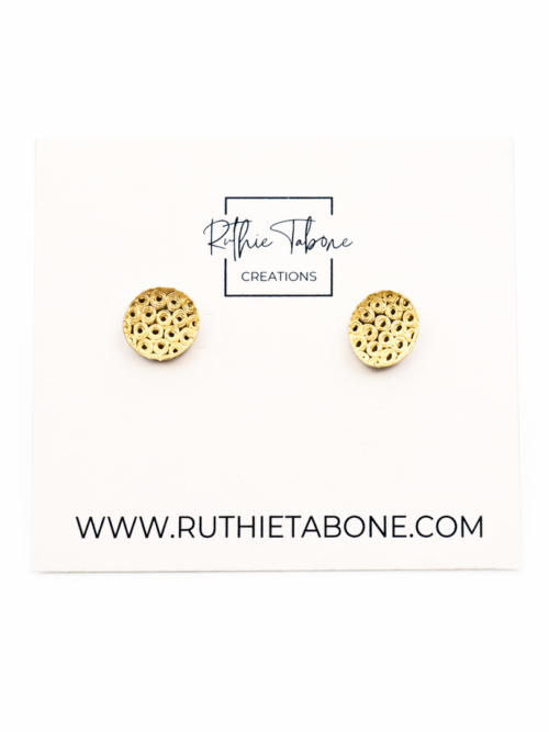 Gold textured circle stud earrings with a detailed dotted pattern, displayed on a Ruthie Tabone Creations card against a clean white background.