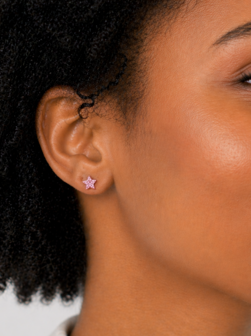 Sweet pink star stud earrings with a subtle textured finish—fun, playful, and perfect for adding a pop of color to everyday looks.