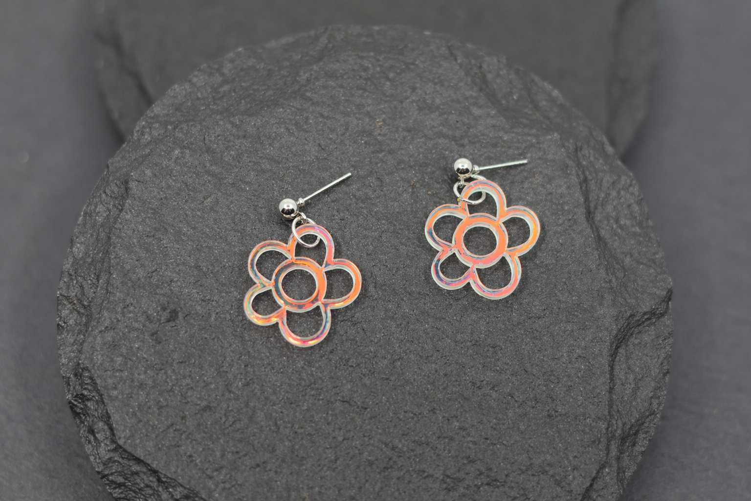 Iridescent outline flower dangle earrings with a delicate open design—lightweight, modern, and full of subtle rainbow shimmer for an eye-catching yet minimal look.