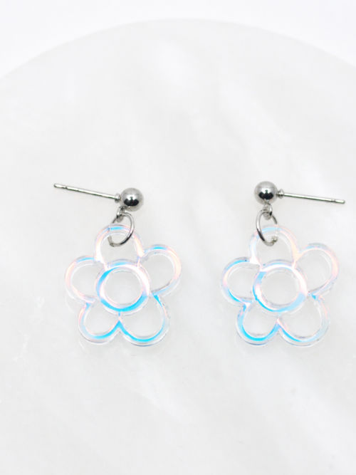 Delicate iridescent flower stud earrings featuring a soft, light-catching shimmer—dainty, feminine, and perfect for adding a subtle glow to any outfit.