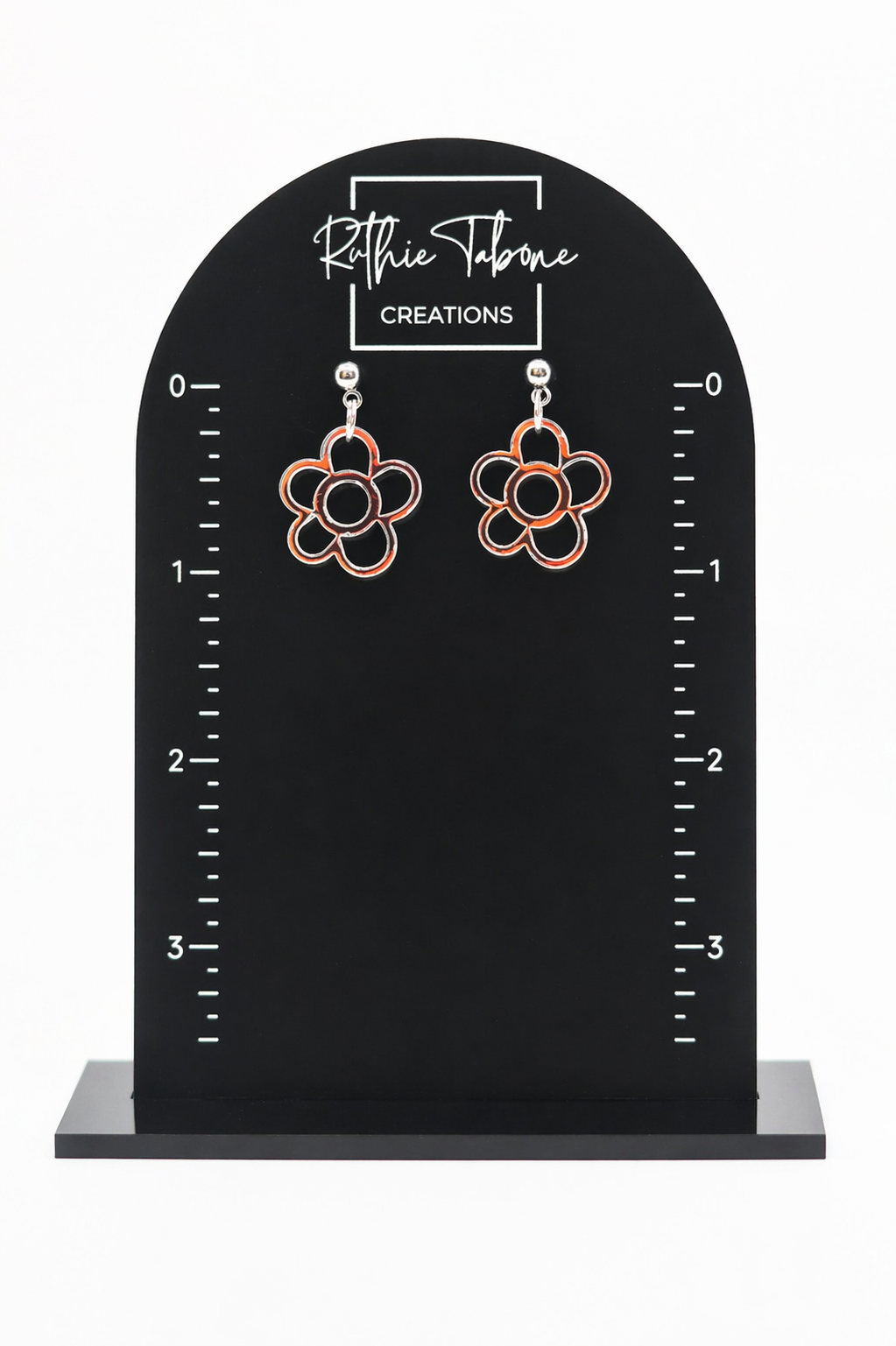 Iridescent outline flower dangle earrings featuring a lightweight, open-petal design with a subtle rainbow sheen—modern, eye-catching, and perfect for adding a soft pop of color to any outfit.
