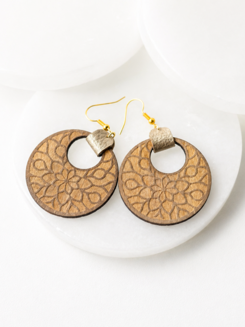 Wooden mandala dangle earrings with laser engraved floral design and gold hook backs