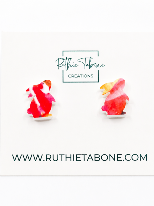 Colorful bunny-shaped stud earrings featuring a vibrant red, pink, and yellow marbled design—lightweight, playful, and perfect for adding a fun pop of color to any spring or Easter outfit.