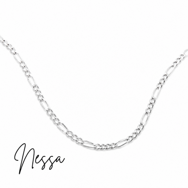Close-up of a delicate sterling silver Figaro chain necklace displayed on a clean white background. The necklace features alternating elongated and round links for a classic, timeless design, making it perfect for everyday wear or layering with other necklaces.