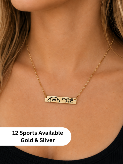 Gold football mom bar necklace featuring an engraved football design and “Football Mom” text, shown on a model with 12 sports available in gold and silver.